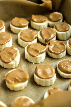 peanut butter and banana slices on top of each other in a baking pan with sauce