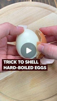 a person holding an egg in their hand with the words trick to shell hard - boiled eggs