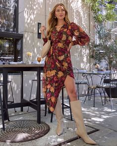 Embrace the season with the Harvest Love Floral Print Wrap Midi Dress. Made from lightweight crepe fabric, this dress flows beautifully with an asymmetric hem that dances with every step. The rich floral print and warm hues celebrate the essence of fall, with an unforgettable wait tie accent that cinches the waist making this look all the more crafted to you. Pair it with your favorite boots for a look that's effortlessly chic and perfectly attuned to fall vibes. Lightweight crepe fabric with as Fall Fitted Floral Print V-neck Dress, Floral Print Mid-length Midi Dress For Fall, Fall Floral Print V-neck Wrap Dress, Fall Floral Print V-neck Boho Dress, Chic Floral Print Midi V-neck Dress, Western Wear Dresses, Fall Dress, Wrap Midi Dress, Long Sleeve Print Dress