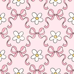 a pink and white flower pattern on a pink background