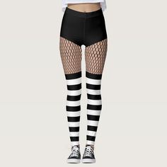 an orange and black striped leggings with fishnet