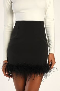 Slip into the Lulus Celebratory Sweetie Black Feather Mini Skirt and raise a glass to your excellent taste! Lightweight woven fabric shapes this chic skirt that has a high-waisted fit with a figure-skimming, A-line silhouette. Feather-trimmed, mini hem creates an ultra cute look! Hidden side zipper/clasp. Pair with the matching blazer for a complete look! Fit: This garment fits true to size. Length: Mid-thigh. Size medium measures 14.75" from waist to hem. Waist: Fitted - very fitted at natural Nye Skirts, Holiday Cocktail Party Outfit, Feather Mini Skirt, Cocktail Party Outfit, Comfy Skirt, Chic Skirt, Feather Skirt, Holiday Skirts, Timeless Outfits