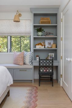 the bedroom is clean and ready to be used as a study area for someone's belongings