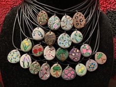 a necklace with many different designs on it