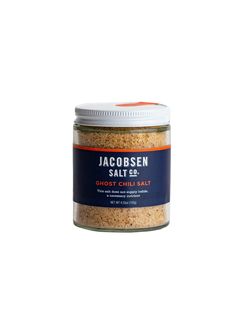 jacobsen salt in a glass jar on a white background with an orange stripe