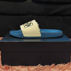 Slides Are A Women's Size 9 Blue Slip-on Slides With Rubber Sole, Blue Rubber Sole Slides Slip-on, Coach Casual Slip-on Sandals, Blue Sporty Flat Sneakers, Blue Flat Sneakers For Streetwear, Sporty Blue Flat Sneakers, Casual Blue Sandals With Rubber Sole, Comfortable Blue Slip-on Slides, Casual Blue Slide Sandals