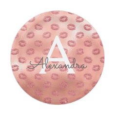 a pink and black leopard print plate with the word alexandria in white letters on it