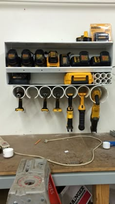 a workbench with various tools on it