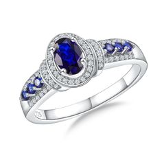 PRICES MAY VARY. Sterling Silver Blue Stone Rings: Crafted from hypoallergenic 925 sterling silver for sensitive skin, this halo oval cut ring with very thick layer of gold plating, ensuring it remains untarnished and retains its brilliant shine for years to come Oval Sapphire Rings for Women: The silver oval rings are meticulously set with a nice and vibrant center garnet stone surrounded by a sparkling halo of 5a cubic zriconia stones, making it a unique and eye-catching ring for female Silver Oval Sapphire Ring, Oval Cut Ring, September Birthstone Rings, Oval Engagement, Blue Stone Ring, Moissanite Jewelry, Garnet Stone, Dream Ring, Birthstone Ring