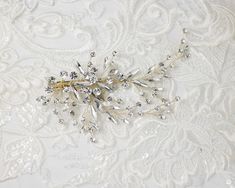 A handmade, hand-wired light gold wedding clip designed with round and elongated marquise crystal stones to delight you on your wedding day. This bridal clip measures about 5 inches long and 2.75 inches high. Bridal Clip, Wedding Clip, Bridesmaid Jewelry