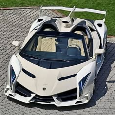 an aerial view of a white sports car