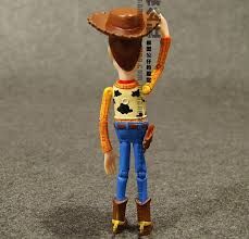 a toy figure with a cowboy hat on