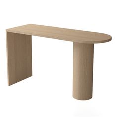 an oval shaped wooden table sitting on top of a white floor