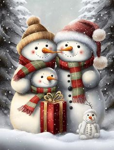 two snowmen standing next to each other in the snow with presents wrapped around them