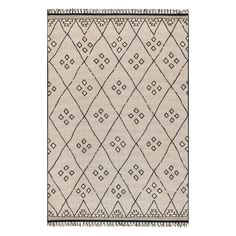 a beige rug with black and white designs on it, in front of a white background