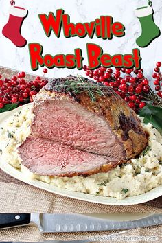 a plate with meat and mashed potatoes next to a christmas stocking saying, whoville roast beef