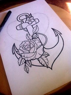 an anchor and rose tattoo design on paper