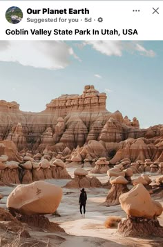 a person standing in the middle of a desert