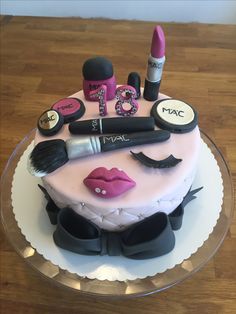 a cake with makeup and lipstick on it