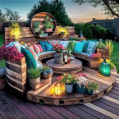 an outdoor seating area with lots of plants and lights