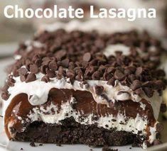 a chocolate lasagna cake with white frosting and chocolate chips on the top