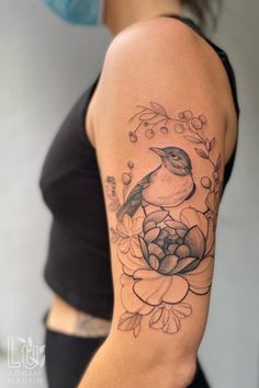 Shows an arm with fresh black linework tattoo of a bird and flower. With black line details and shading. Floral Bird Tattoo, Bird Tattoo, Birds Tattoo, Dreamcatcher Tattoo