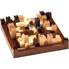 a wooden board game with buildings on it