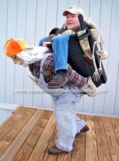 a man in overalls and a hat carrying a backpack on top of a wooden deck