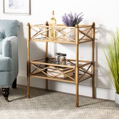 a living room with a blue chair and a wooden shelf next to a white wall