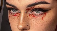 Wet Liner Looks, Red Liner Makeup, Red And Black Eyeliner, Fire Eyeliner, Red And White Makeup, Cool Eyeliner Ideas, Red Graphic Liner