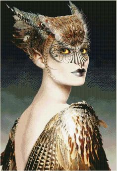 a woman with feathers on her head and an owl's face is shown in this cross stitch pattern