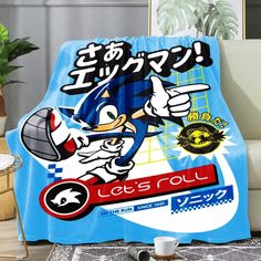 a blue blanket with an image of sonic the hedge on it