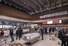 people are standing in line at the food court