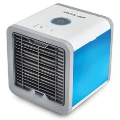 a white and blue air cooler sitting on top of a table