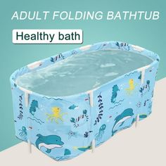 an advertisement for a baby's bathtub with dolphins and sea creatures on it