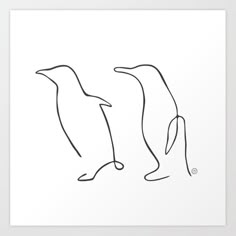 two penguins are standing next to each other