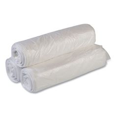 two rolls of white plastic wrap on top of each other