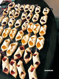 small pastries on a cooling rack ready to be baked in the oven for consumption