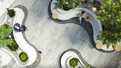 an aerial view of people sitting on benches in a park with stone walkways and trees