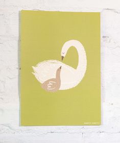 Bring the beauty of nature into your child's bedroom with this lovely Swan Art Print. The mama and baby swans are depicted in fresh, earthy colours which pop against an olive / moss green background, making it a perfect addition to any nursery décor or interior space. Made in the UK, this high-quality art print is printed on 250gsm recycled cotton paper stock and comes in fully compostable packaging, making it a kind and sustainable choice for your child's bedroom.  The gentle and peaceful image Swan Graphic, Swan Princess Poster, Swan Family Painting, The Wild Swans Illustrations, Baby Swan, Swans Art, Childrens Playroom, Illustration Wall Art, Woodland Nursery