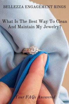 someone is holding their engagement ring on top of a blue cloth with the words, what is the best way to clean and maintain my jewelry?