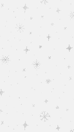 the snowflakes are falling down on the white wallpaper and it looks like they have been frosted