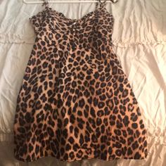 Cute Animal Print Mini Dress Front Has Covered Button Detail & Cute Ruffle Trim, No Lining But Not See Through. Size M Fits Like A Small, Never Worn. Fitted Leopard Print Daywear Dress, Fitted Leopard Print Day Dresses, Fitted Leopard Print Dresses For Daywear, Animal Print Dresses, Printed Mini Dress, Ruffle Trim, Covered Buttons, Dress Details, Animal Print