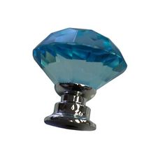 an image of a blue crystal knob on a white background in the shape of a diamond