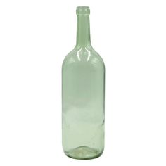 an empty green glass bottle on a white background