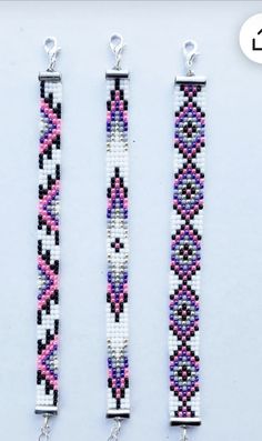 three bracelets with different colors and designs are shown on a white background, one is purple