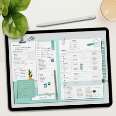 a tablet with a planner on it next to a cup of coffee