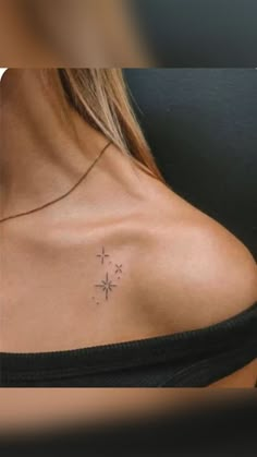 a woman with a small tattoo on her chest