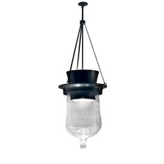 a light hanging from a ceiling fixture with a glass bowl on the bottom and black metal frame