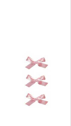 three pink bows on white background